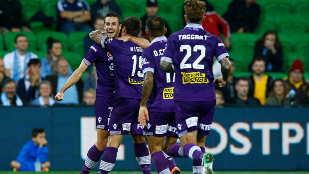 Perth Glory players celebrate Joel Chianese's goal in their 2-0 win over Melbourne City.