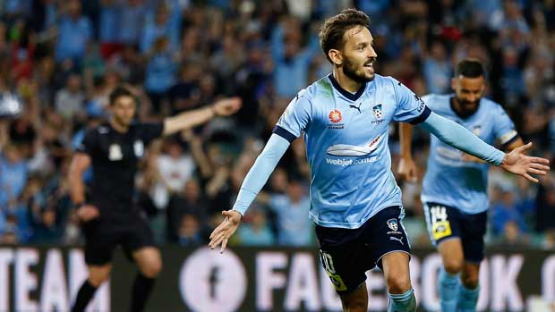 Milos Ninkovic celebrates after grabbing the opening goal in Sydney FC's clash with Newcastle Jets on Saturday night.